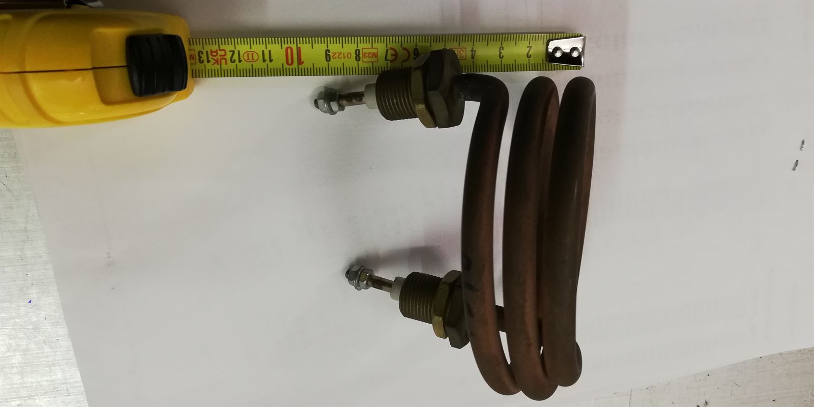 RESISTENCIA ESPIRAL SUMERGIDA 1000W, 220V, DIAMETRO 100 MM, DIAMETRO AGUJERO AMARRE17MM, DISTANCIA AMARRE 70MM,  A.V516 - Imagen 1